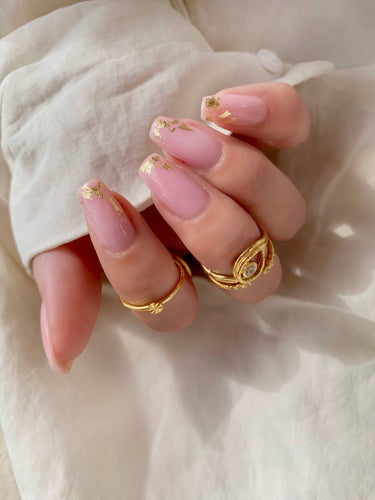 Nail art with gold flakes